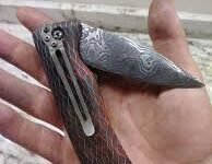 Damascus pocket knife