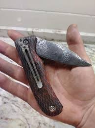 Damascus pocket knife